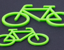 grünes Fahrrad auf schwarzem Grund